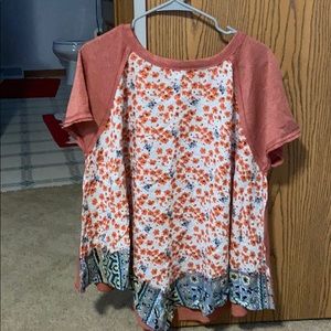 New size Large. Flowy near waist.